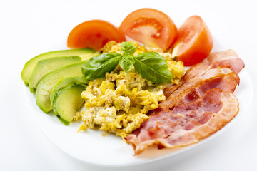 bacon and eggs with avocado and tomato, bread and coffee