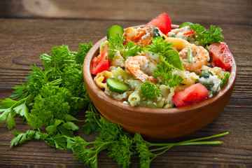  delicious gigli t with shrimps and basil on  plate