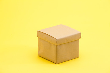 Gift box on yellow background