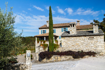 Fototapeta na wymiar Beautiful old stone house with blue window. Croatia side view