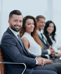 group of business people sitting at the desktop