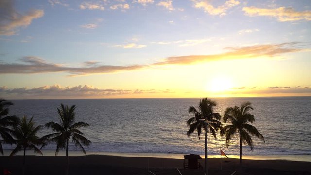 Beautiful sunset at the Atlantic Ocean in Puerto Naos at La Palma / Canary Islands
