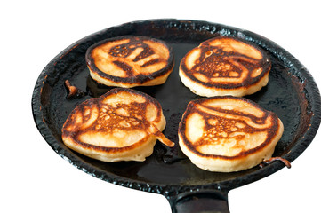 Fryers in the pan. The process of cooking fryers. Fry fryers on frying pan.