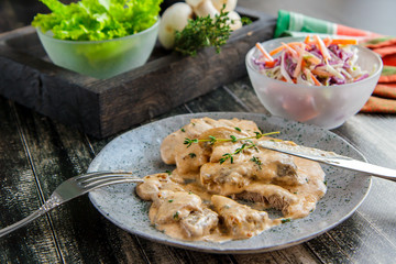 Beef Stroganoff with mushroom gravy, thyme and vegetable salad