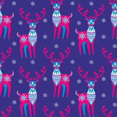Fototapeta na wymiar Decorative seamless pattern in folk style with reindeer image. Colorful vector background.