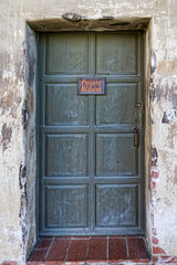 Distressed Wall and Closed Door Backdrop