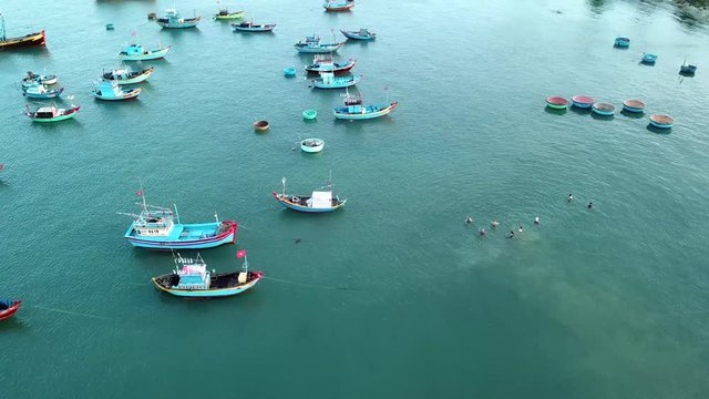 Top view. Aerial view from drone. Royalty high quality free stock image of Mui Ne fishing harbour or fishing village. Mui Ne fishing harbor is a popular tourist destination. Phan Thiet city, Vietnam