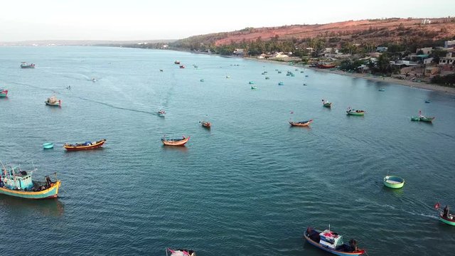 Top view. Aerial view from drone. Royalty high quality free stock image of Mui Ne fishing harbour or fishing village. Mui Ne fishing harbor is a popular tourist destination. Phan Thiet city, Vietnam