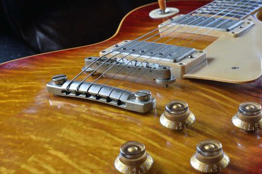"Rock and Roll" unretouched close up photo of historic iconic authentic mid century electric guitar