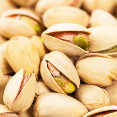 Sea Salt Roasted Pistachios Background. Selective focus.