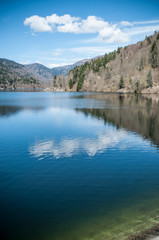 panorama of lake of Kruth with cloud reflection in alsace - France