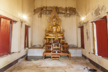 seated Buddha Chinnaratimage in the temple made from mental under cover in old building