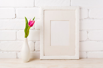 White frame mockup with magenta pink tulips