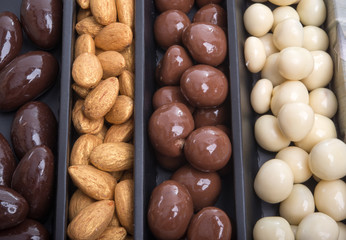Tasty mix. Assortment of nuts in chocolate
