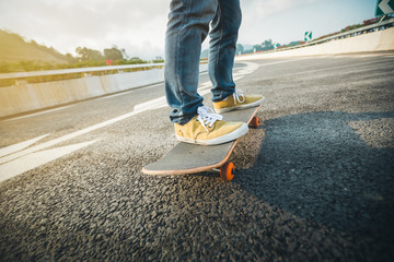 Skateboarder sakteboarding on city street