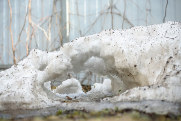 melting snow pile in the yard