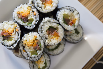 Kimbap filled with vegetables, egg and ham