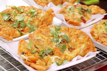 Crispy fried mussels with egg
