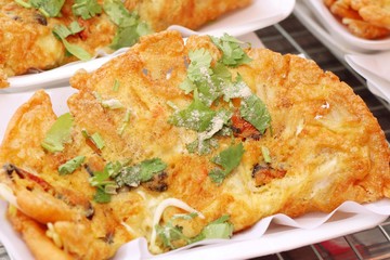 Crispy fried mussels with egg