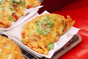 Crispy fried mussels with egg