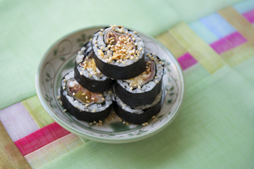 Kimbap filled with kimchi, vegetables, egg