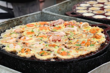 Coconut milk mix seafood and flour