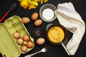 Omelette Preparation Eggs milk Flowers Black Background Flat Lay Food Recipe Breakfast