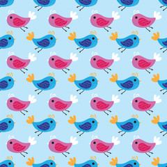 Pink and blue birds pattern background. Seamless pattern colored birds on blue background.