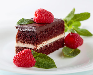 Chocolate cake with raspberry and mint.