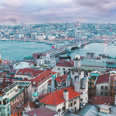 Panoramic views of the Bosphorus and the old part of Istanbul with lots of mosques at evening. Aerial view