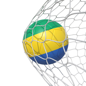 Gabon Gabonese flag soccer ball inside the net, in a net.