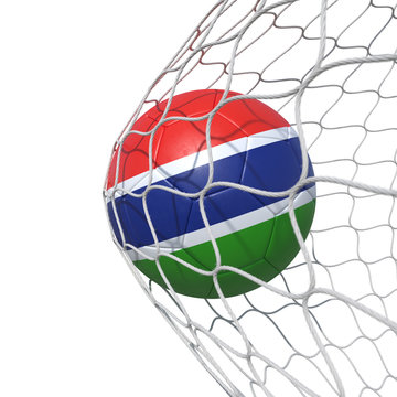 Gambia Gambian flag soccer ball inside the net, in a net.