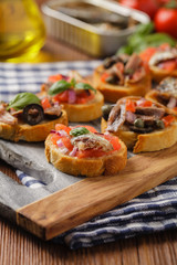 Mix Bruschetta with sardines and anchovies.