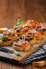 Mix Bruschetta with sardines and anchovies.