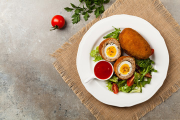 Meatballs with minced meat stuffed with boiled egg.