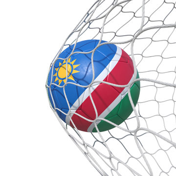 Namibia Namibian flag soccer ball inside the net, in a net.