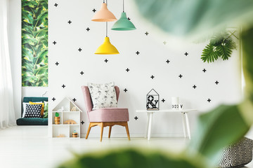 Armchair with flamingo pillow