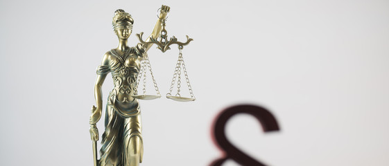 Law symbols on bright background. 