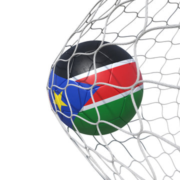 South Sudan flag soccer ball inside the net, in a net.