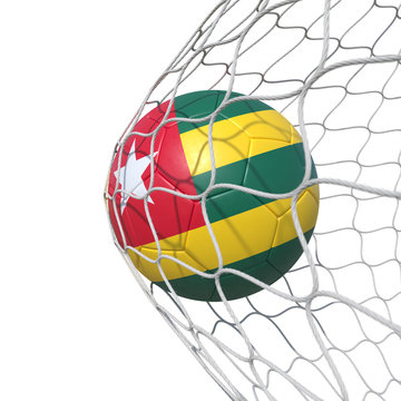 Togo Togolese flag soccer ball inside the net, in a net.