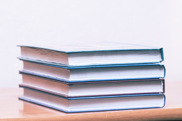 Pile of books on a light background