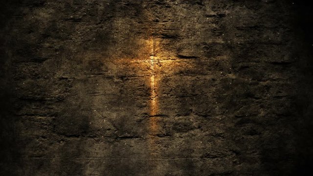 Glowing christian holy cross on cement wall background