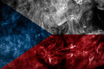 National flag of Czech Republic from dense colored smoke on a black isolated background
