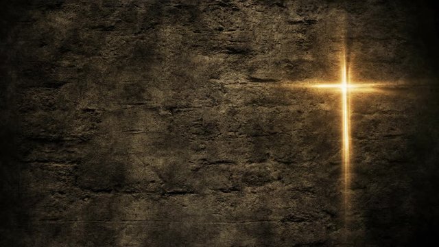 Glowing christian holy cross on cement wall background