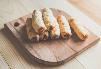 Puff pastry rolls filled with nuts and jam. Arabic cuisine.
