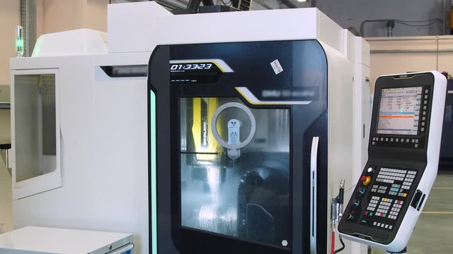 CNC machine with electronic control and timer