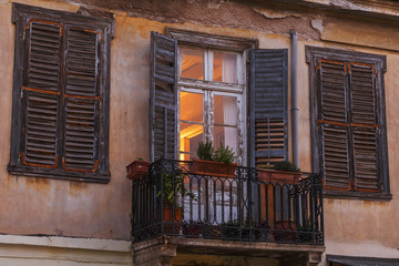 Obraz na płótnie Canvas Balcony of an old neoclassical building in Plaka, the old town of Athens, Greece. 