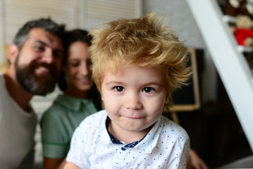 Portrait of cute little boy with blond hair