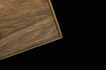 Wooden product made of wood on a black background