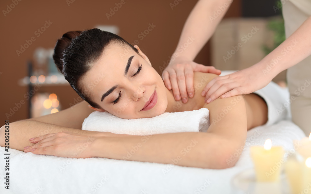 Canvas Prints Young woman receiving massage in spa salon